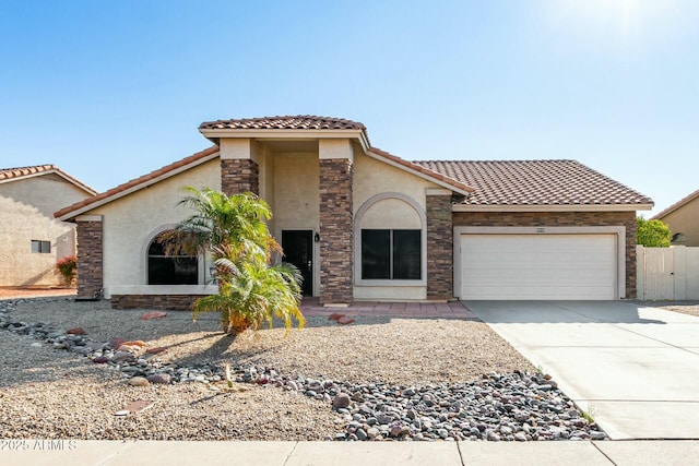 mediterranean / spanish-style house featuring a garage