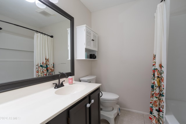 full bathroom featuring vanity, shower / bath combo, toilet, and tile patterned flooring