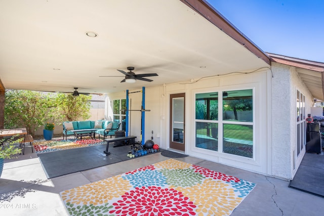 view of patio featuring an outdoor hangout area and ceiling fan