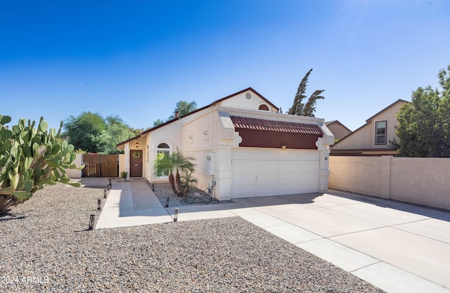 view of front of property with a garage