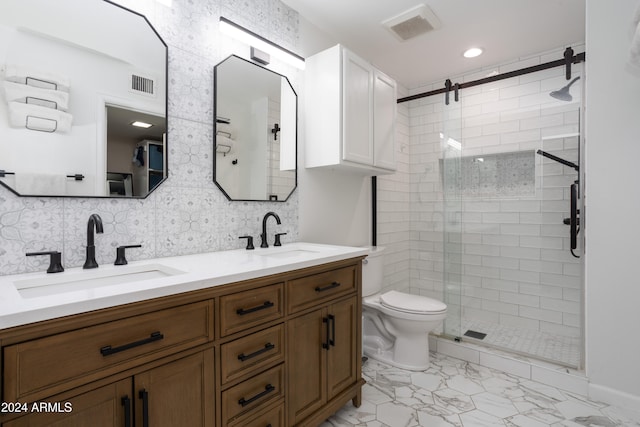 bathroom featuring vanity, an enclosed shower, decorative backsplash, and toilet