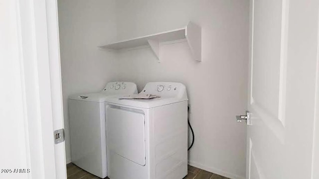 laundry room with laundry area and washing machine and dryer