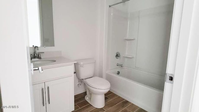 full bath with toilet, vanity, shower / washtub combination, and wood tiled floor