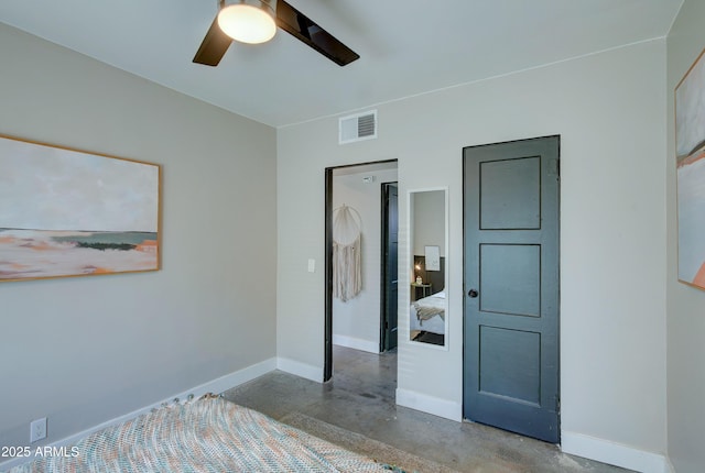 unfurnished bedroom featuring concrete floors and ceiling fan