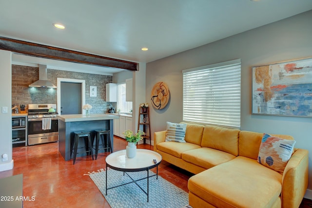 living room featuring beam ceiling