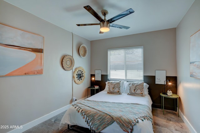 bedroom featuring ceiling fan and light colored carpet