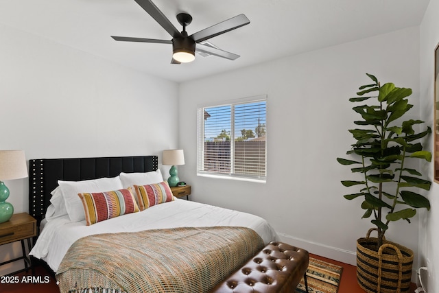 bedroom featuring ceiling fan and wood-type flooring