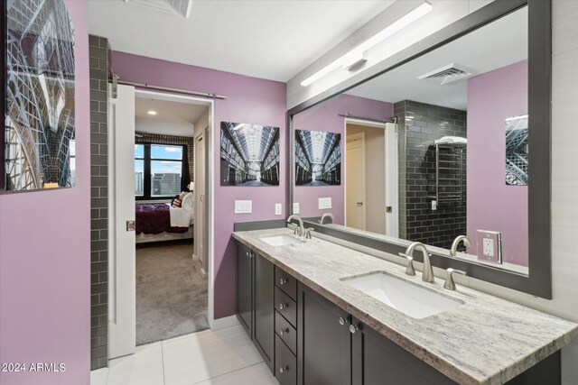 bathroom with vanity and tile patterned floors