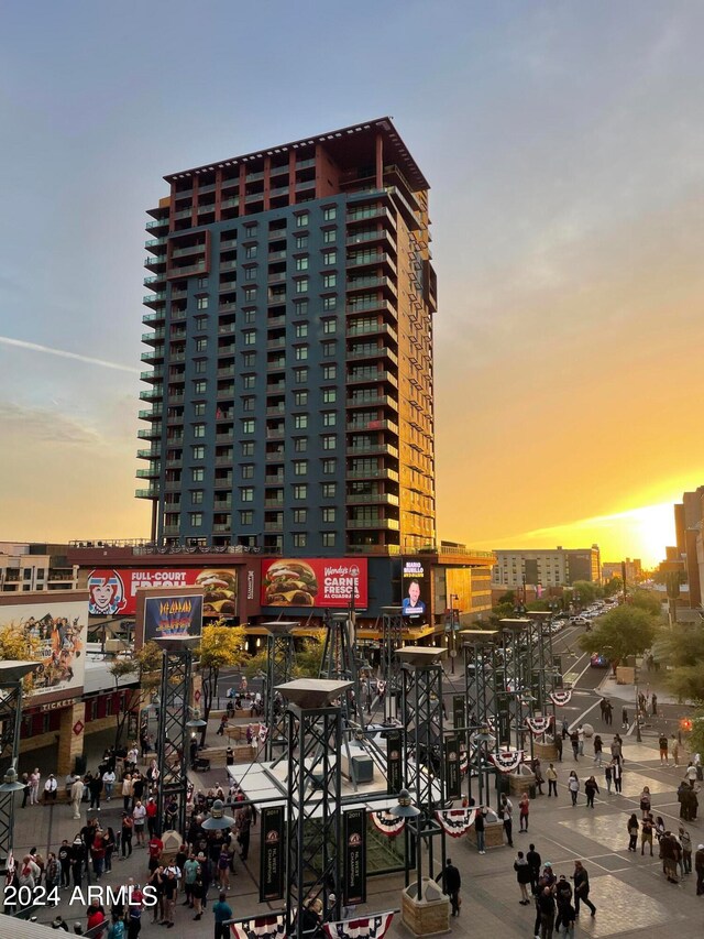 view of outdoor building at dusk