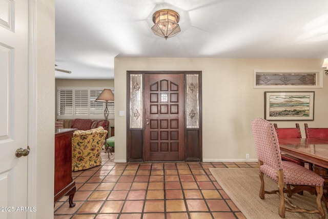 entryway with tile patterned floors