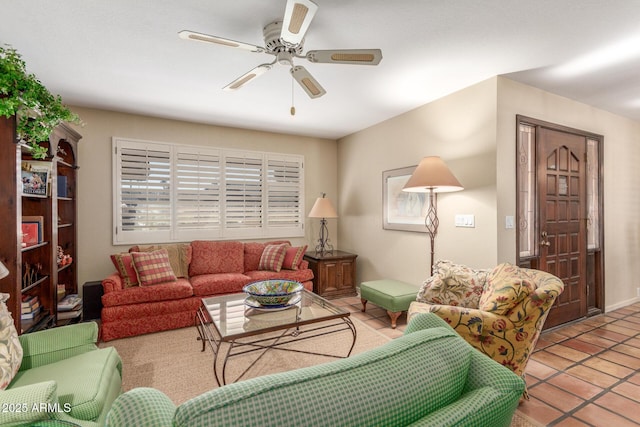 living room featuring tile patterned flooring and ceiling fan