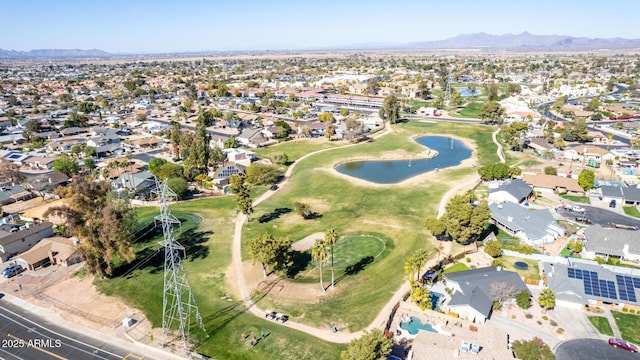 drone / aerial view featuring a water and mountain view