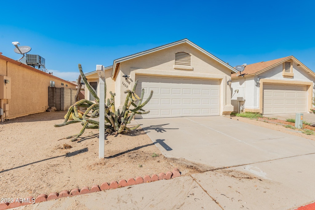 3408 W Kimberly Way, Phoenix, AZ 85027 - ranch-style home featuring a garage and central AC unit