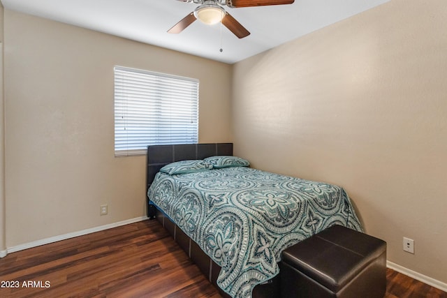 bedroom featuring ceiling fan and dark hardwood / wood-style flooring