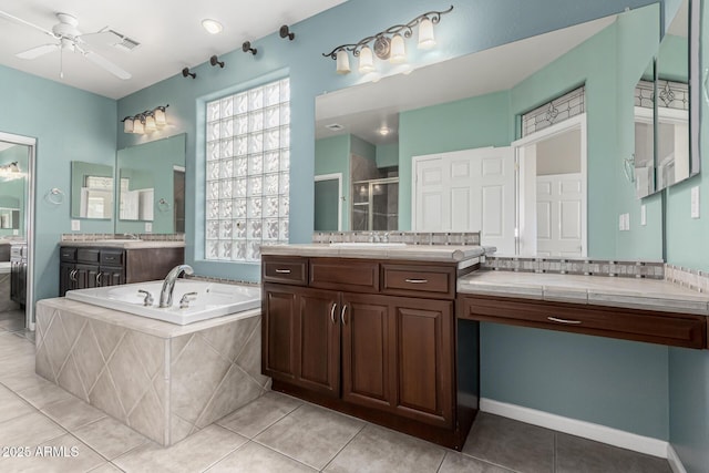 bathroom featuring ceiling fan, vanity, separate shower and tub, and tile patterned flooring