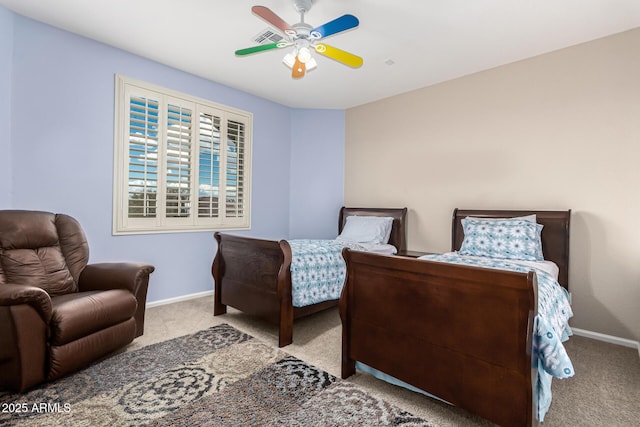 bedroom featuring light colored carpet and ceiling fan