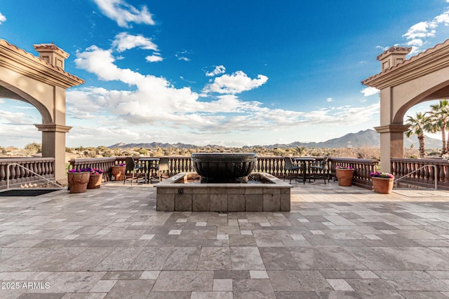 view of patio featuring a mountain view