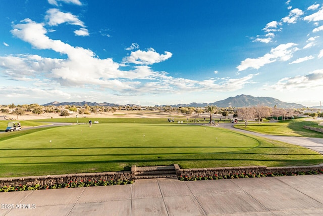 surrounding community with a mountain view