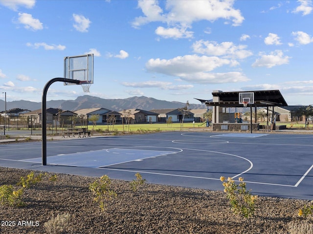 view of basketball court featuring a mountain view