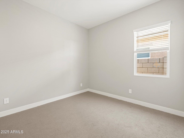 empty room featuring carpet floors