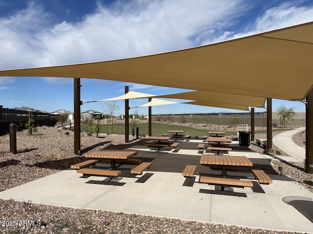 view of community with a patio