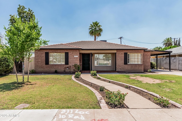 2807 N 8th Ave, Phoenix, AZ 85007 - ranch-style home with brick siding, driveway, and an attached carport