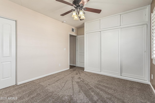 2807 N 8th Ave, Phoenix, AZ 85007 - unfurnished bedroom with light carpet, baseboards, and ceiling fan