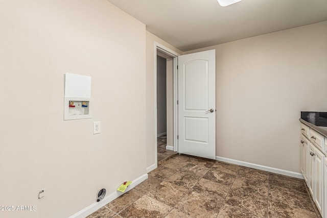2807 N 8th Ave, Phoenix, AZ 85007 - laundry room with baseboards, washer hookup, and cabinet space