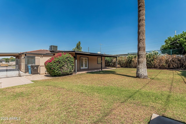 2807 N 8th Ave, Phoenix, AZ 85007 - view of front facade featuring a gate, french doors, and central AC unit
