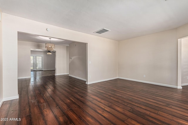 2807 N 8th Ave, Phoenix, AZ 85007 - unfurnished room featuring dark wood finished floors and baseboards