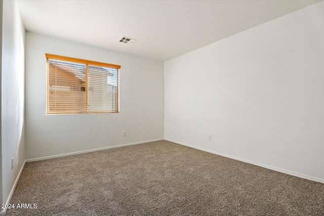 unfurnished room with carpet floors