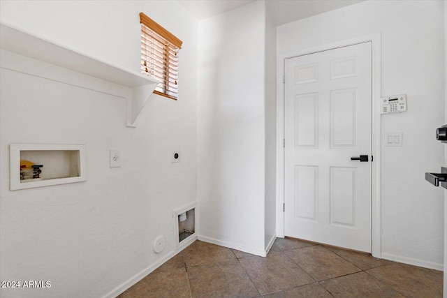 laundry room featuring washer hookup, tile patterned floors, gas dryer hookup, and electric dryer hookup