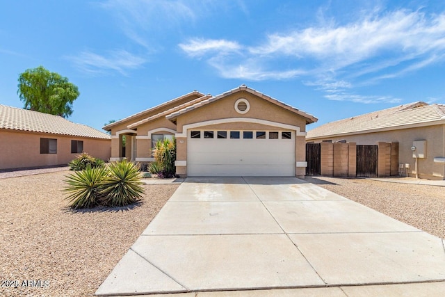 single story home featuring a garage