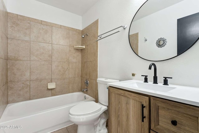 bathroom featuring toilet, tile patterned floors, bathtub / shower combination, and vanity