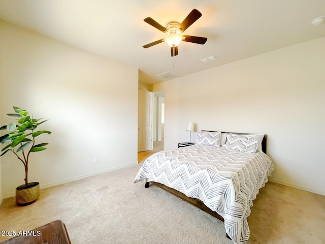 8521 S 67th Dr, Laveen, AZ 85339 - carpeted bedroom with baseboards, visible vents, and a ceiling fan