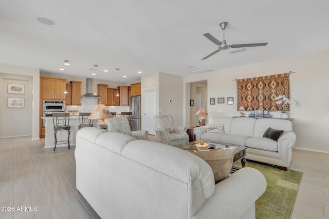 living room featuring ceiling fan