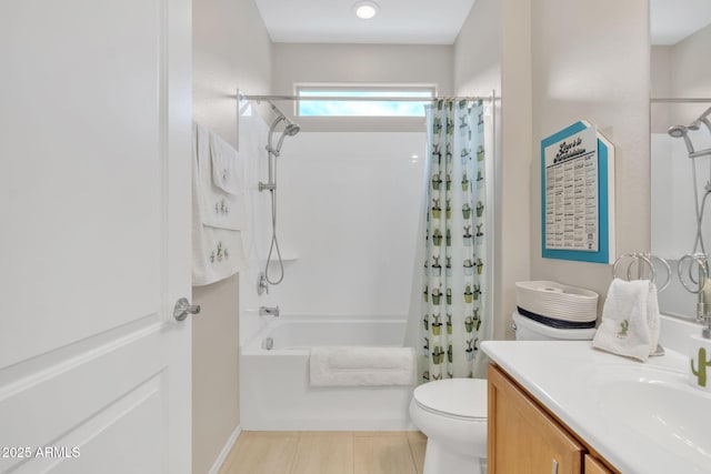 full bathroom with shower / tub combo with curtain, vanity, and toilet