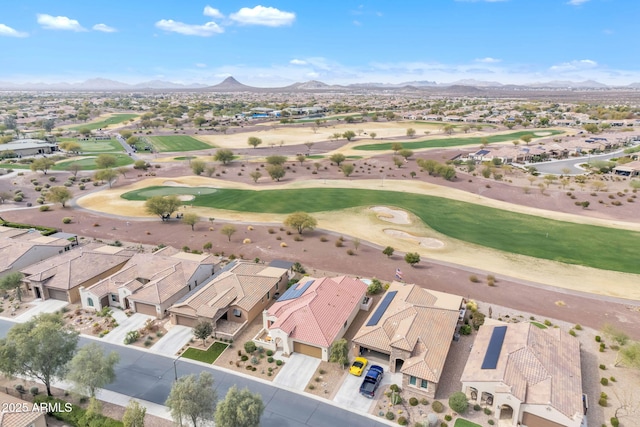 birds eye view of property featuring a mountain view