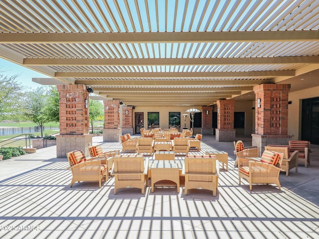 view of patio with an outdoor hangout area and a pergola