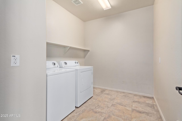 laundry area with washer and clothes dryer