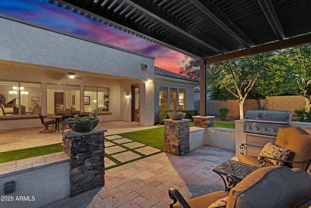 view of patio / terrace featuring fence, a pergola, and a grill