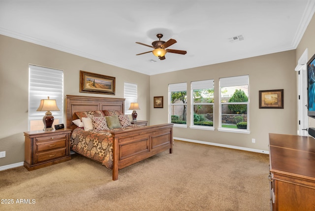 bedroom featuring visible vents, ornamental molding, a ceiling fan, baseboards, and light colored carpet