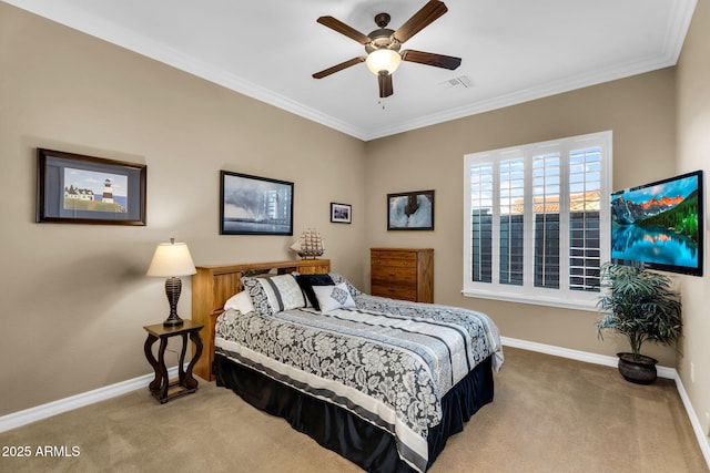 carpeted bedroom featuring ceiling fan, visible vents, baseboards, and ornamental molding