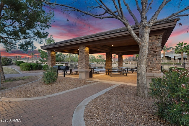 view of home's community featuring a gazebo and fence