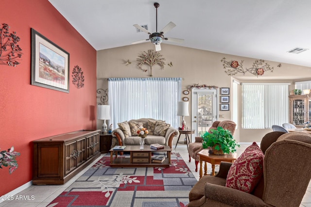 tiled living room with vaulted ceiling and ceiling fan