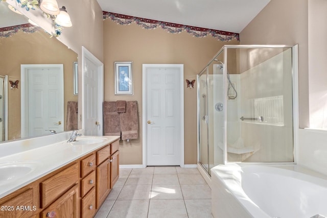 bathroom with plus walk in shower, tile patterned flooring, vaulted ceiling, and vanity