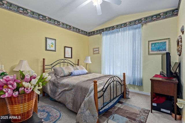 bedroom featuring ceiling fan, carpet floors, and lofted ceiling