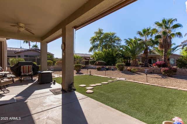 view of patio featuring ceiling fan