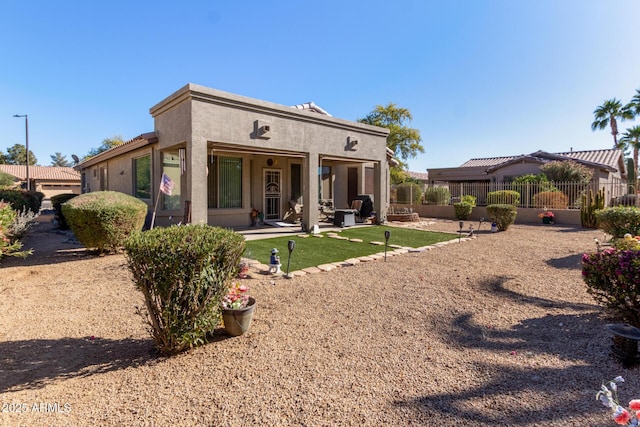 view of front of house with a patio