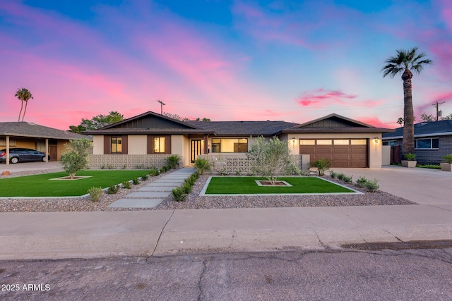 single story home with a yard, stucco siding, concrete driveway, and a garage